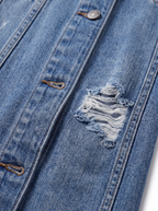 Denim duster distressed texture close up detail