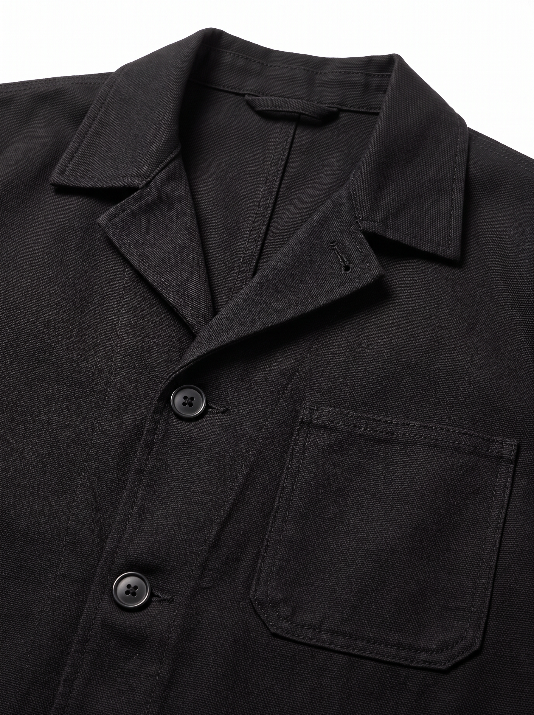 Chore jacket collar and patch pocket close up detail