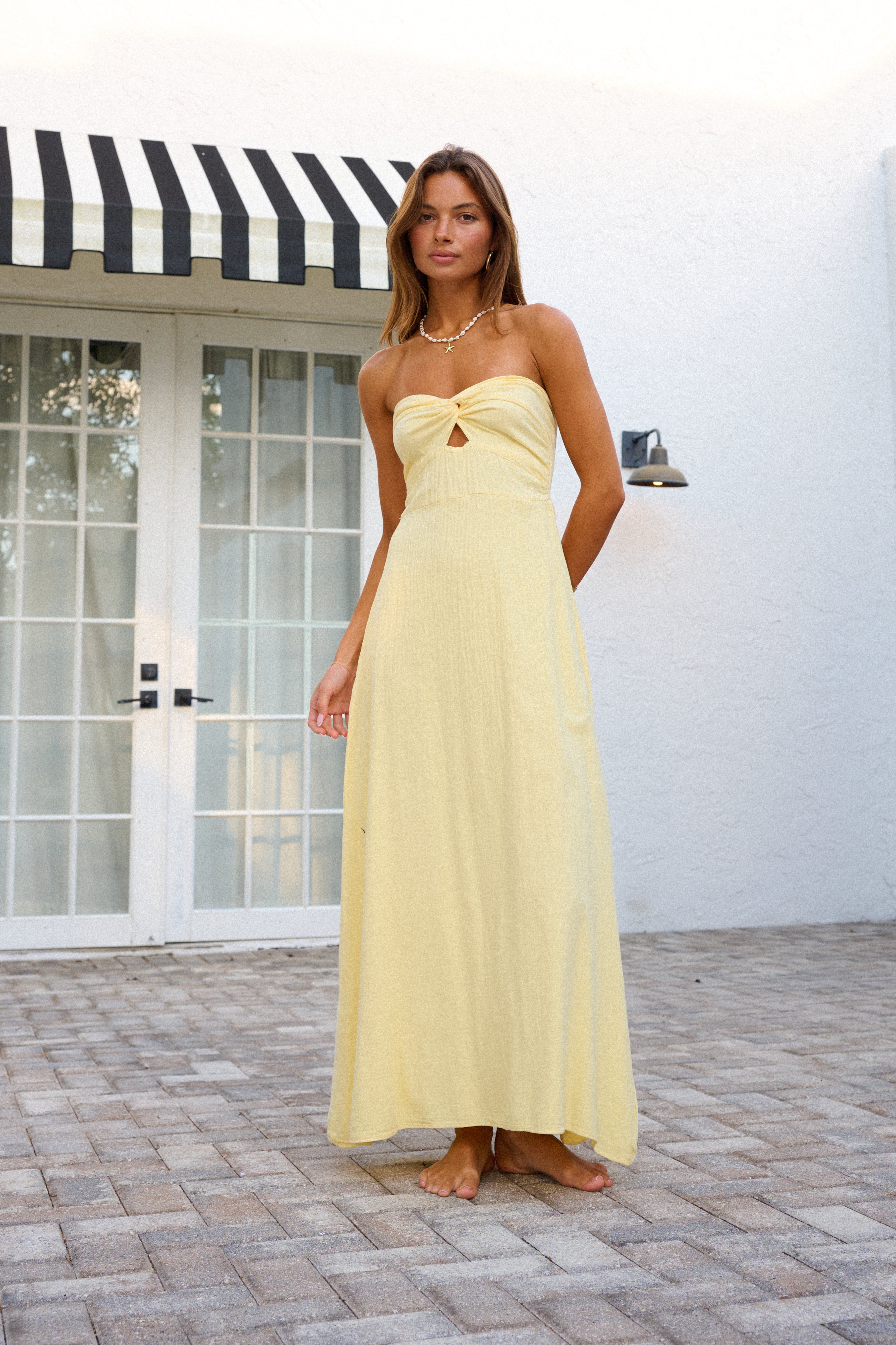 Annaliza Dress — Strapless Twist-Front Cotton Maxi Dress with Side Slit, Elegant Flowy Silhouette