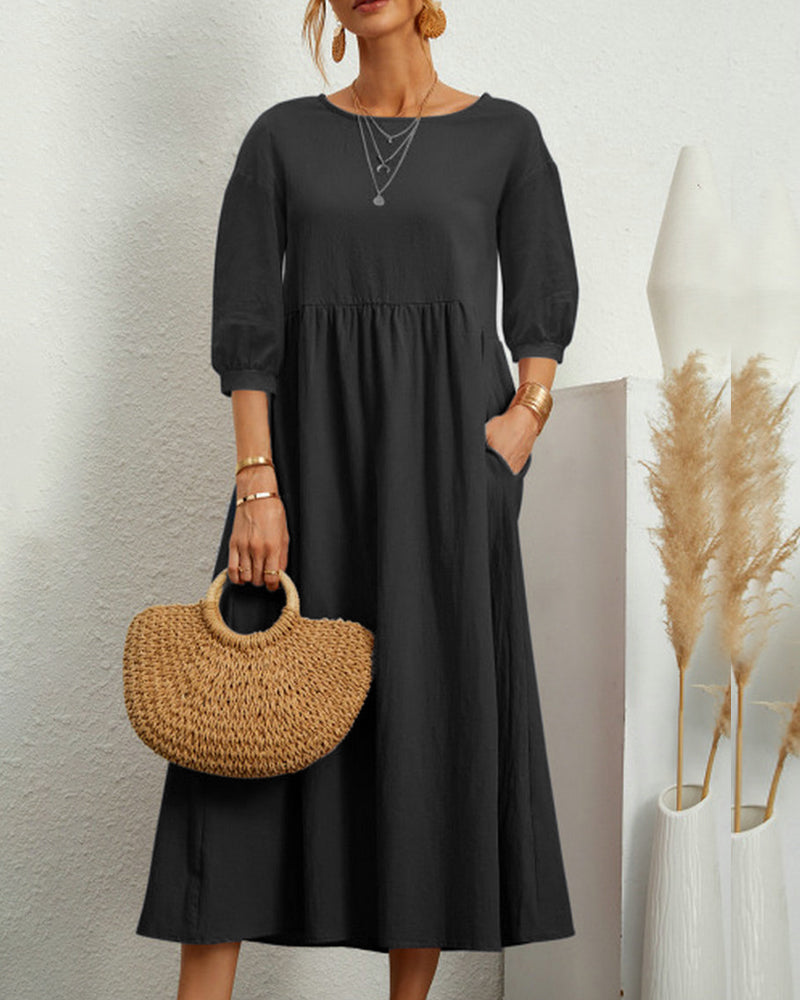 Lantern sleeve midi dress styled for a special occasion