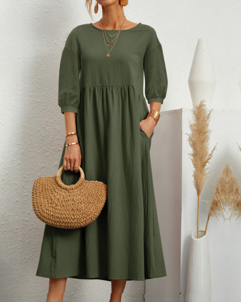 Back view of comfortable lantern sleeve midi dress