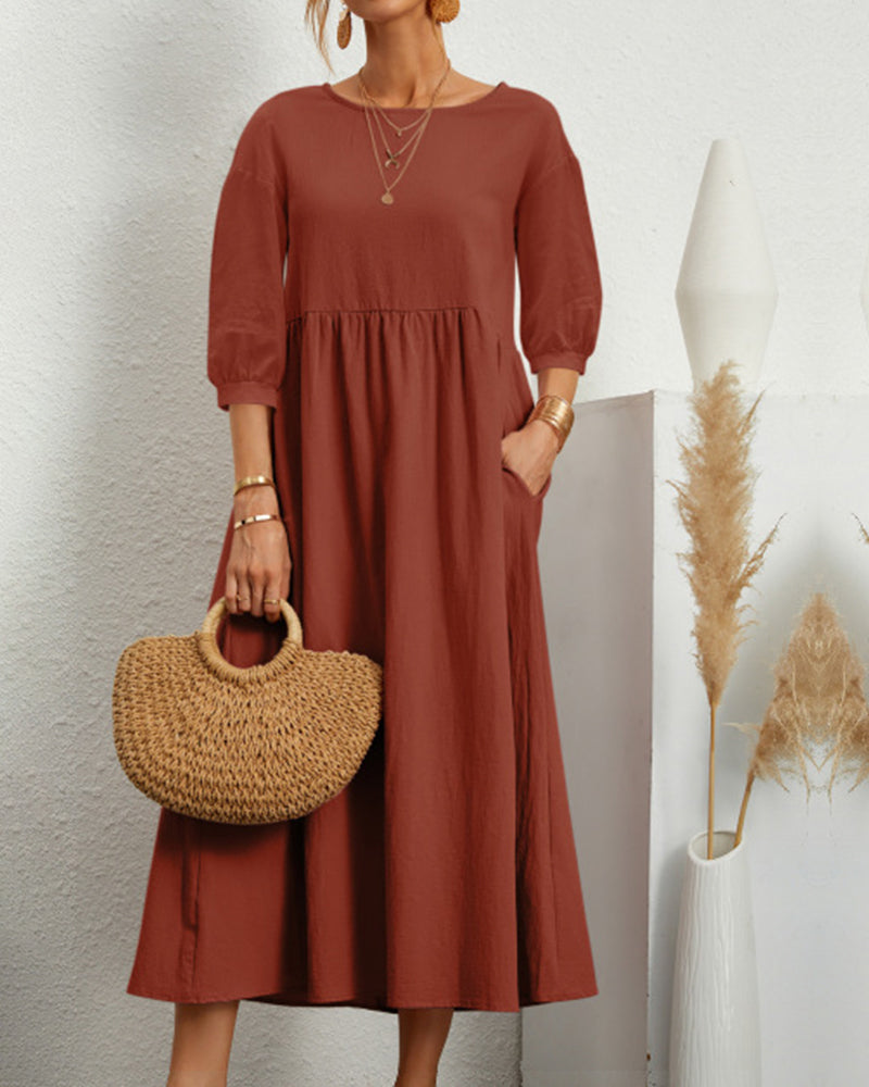Round neckline detail of womens midi dress