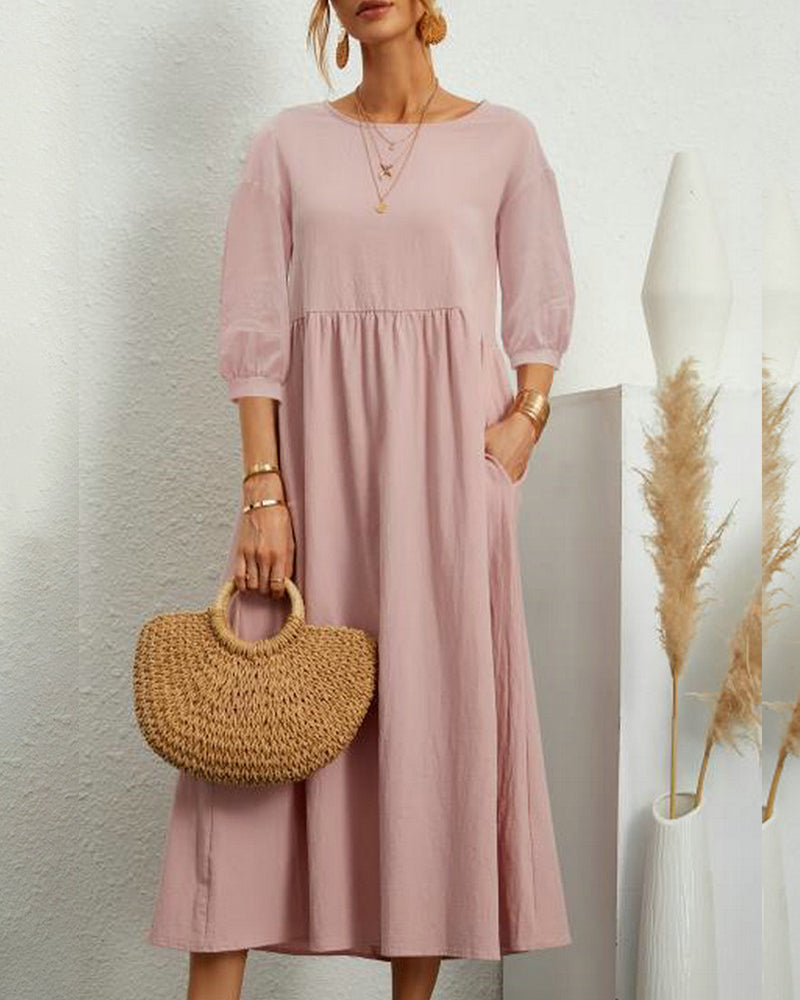 Lantern sleeve midi dress shown in a neutral color