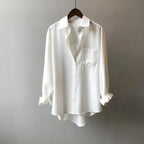 Chest pocket and button detail of womens casual shirt