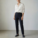 Side view of womens relaxed button up shirt