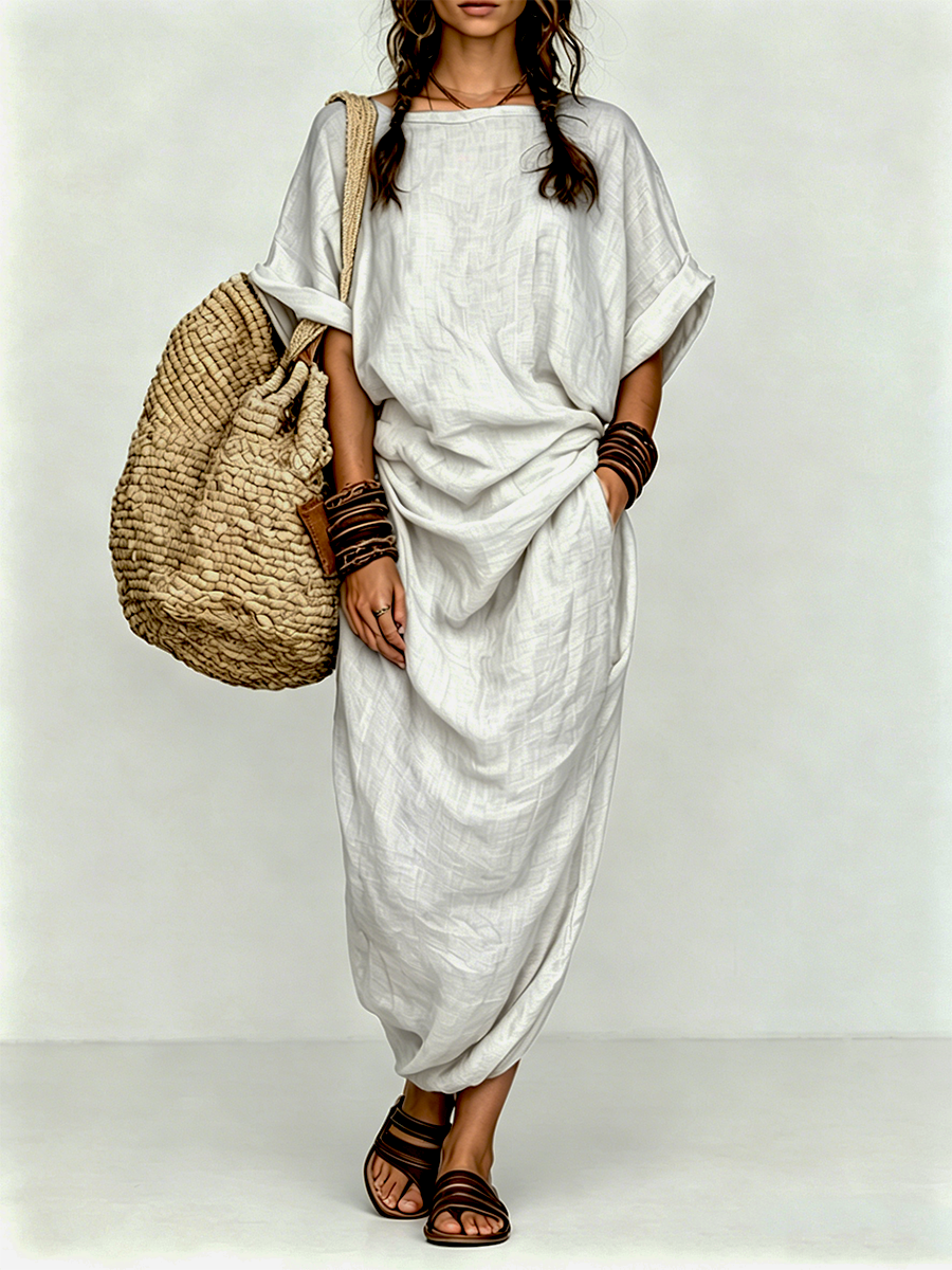 Woman wearing olive green oversized maxi dress, effortless bohemian summer style