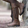 Dark brown leather knee high riding boot with buckle strap