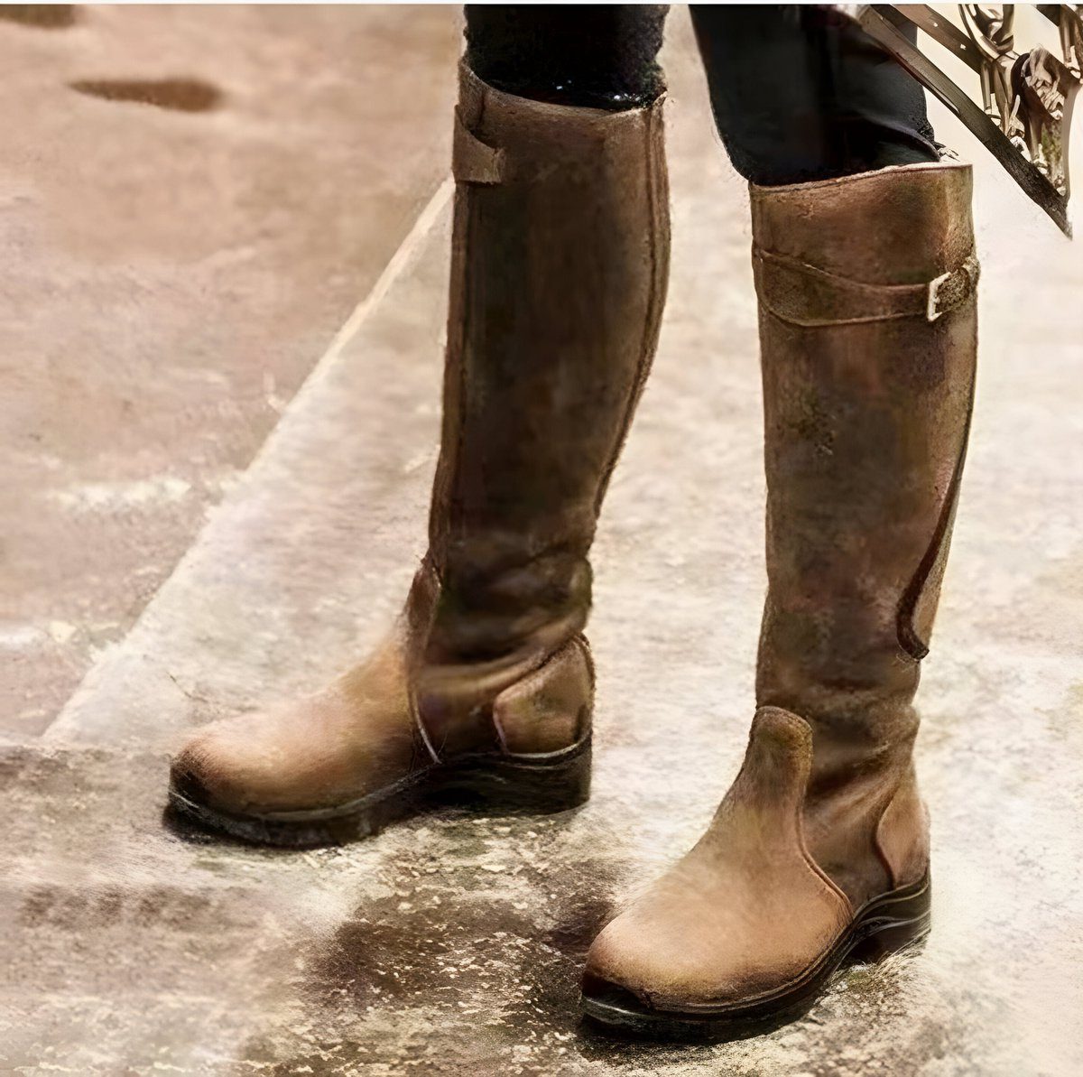 Brown leather knee high riding boot with buckle strap
