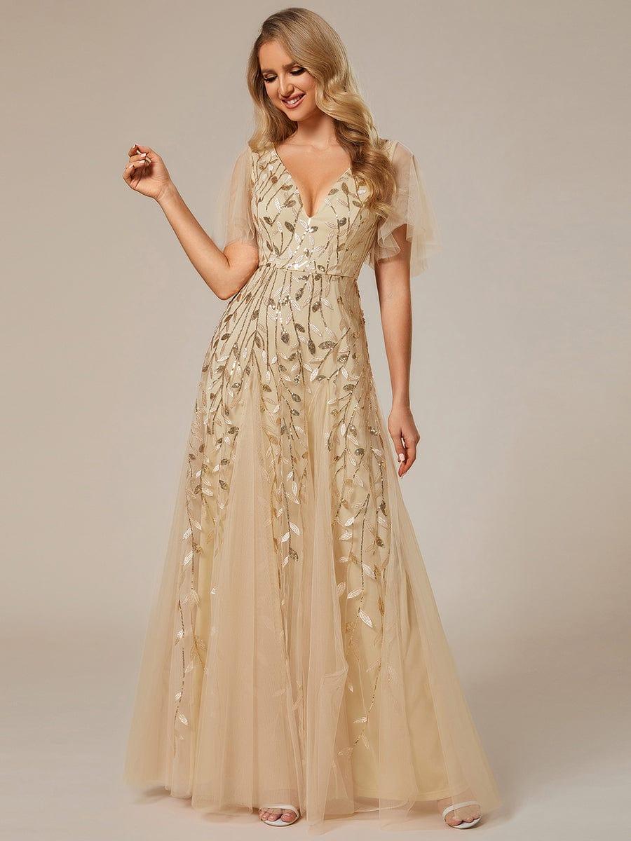 Back view of shimmery sequin maxi evening gown with ruffle sleeves