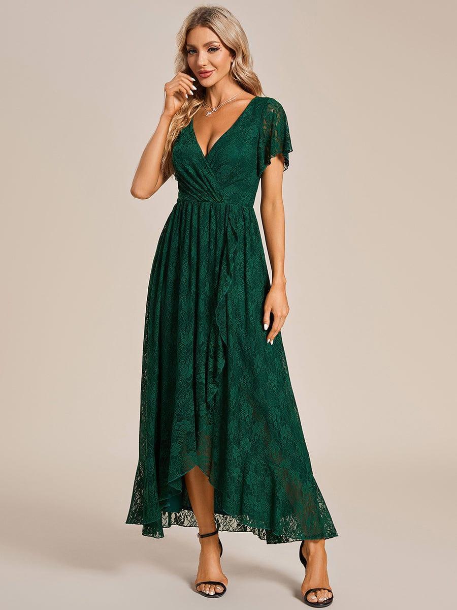 Full length view of womens pleated V neck lace evening dress