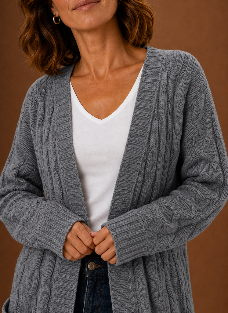 Grey cable knit cardigan texture close up