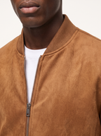 Suede bomber ribbed knit collar and zipper close up detail