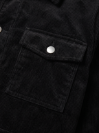 Corduroy cargo jacket flap pocket and wale texture close up detail