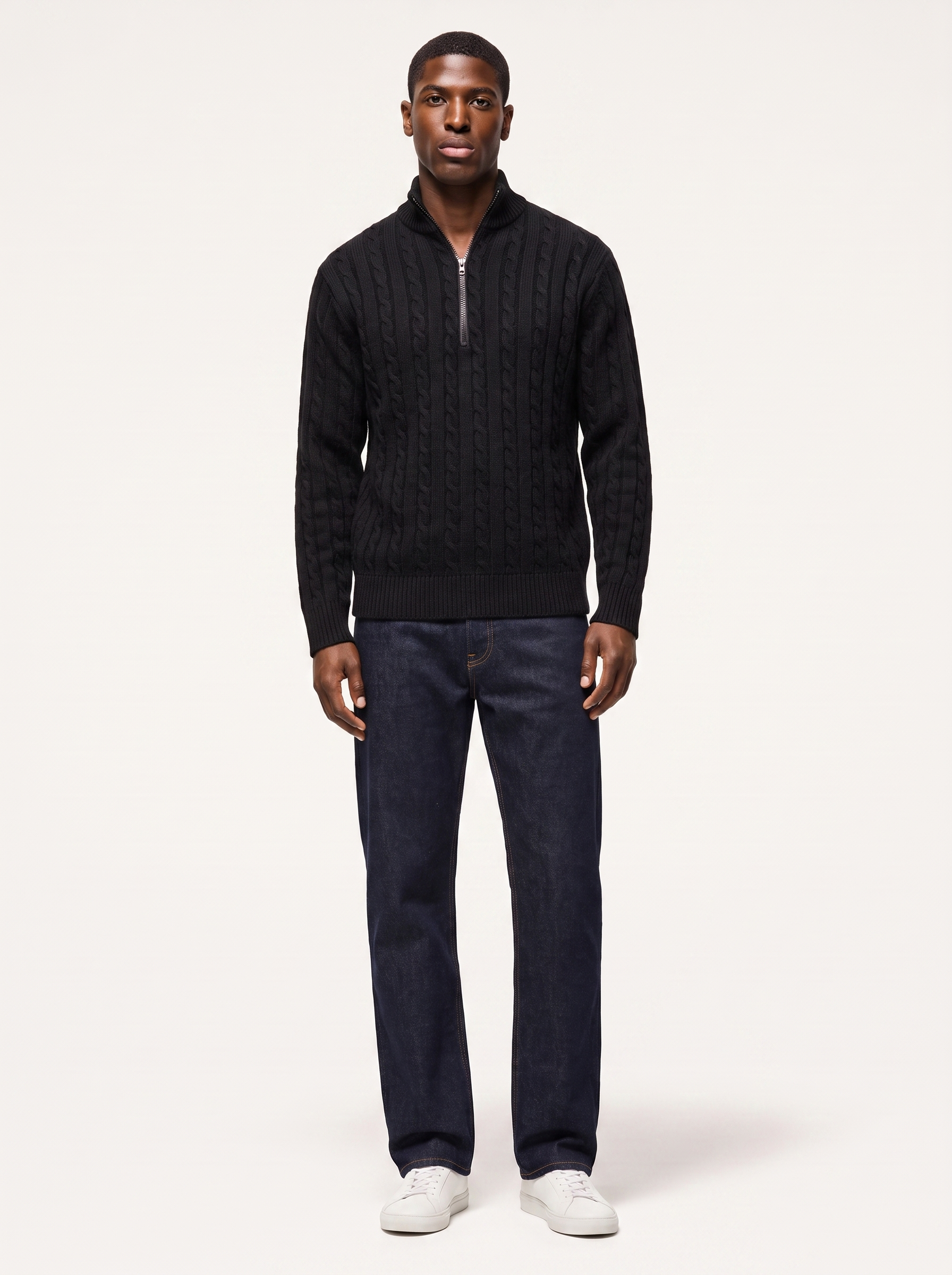 Knit quarter zip pullover sweater worn by model, front view on white