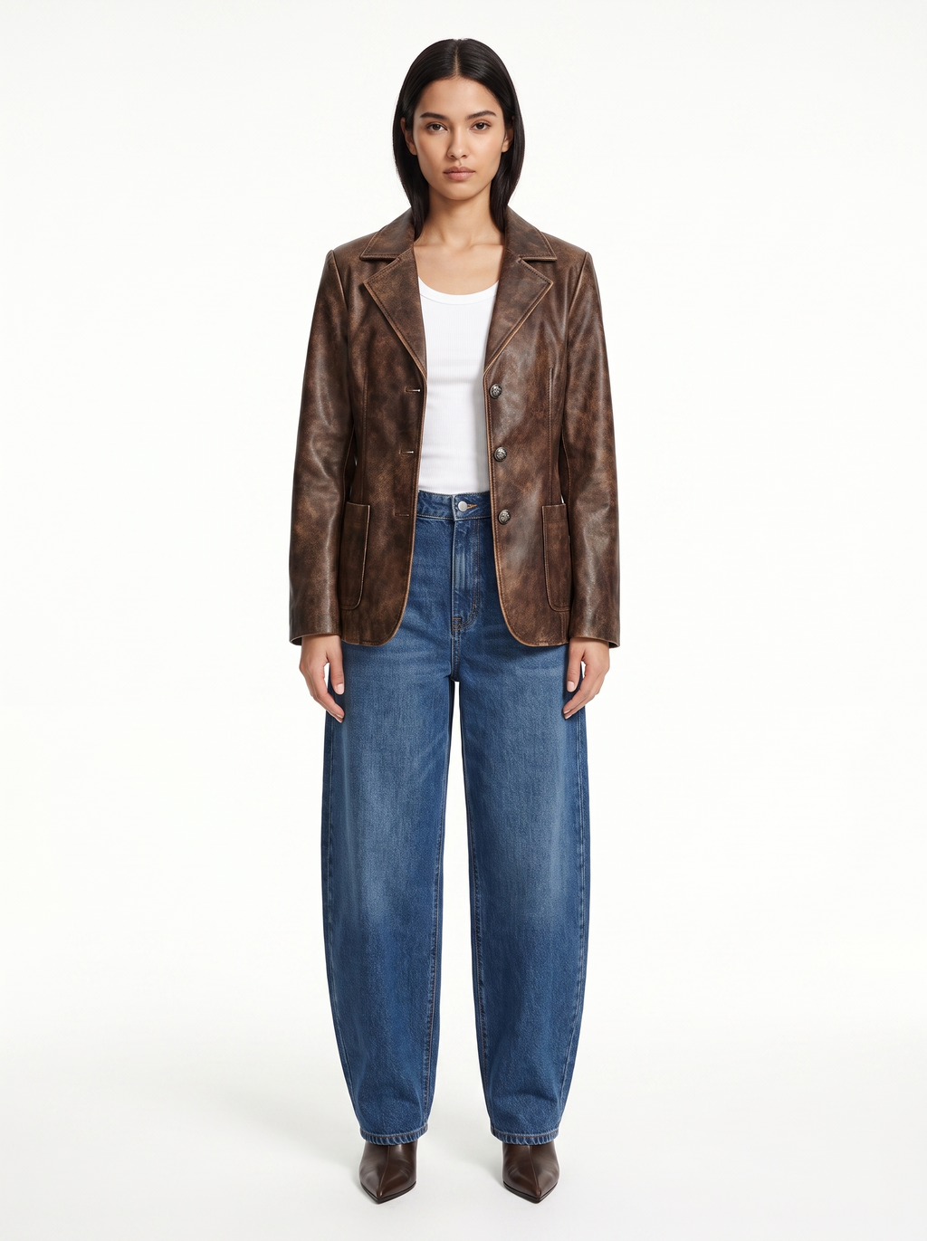 Vintage washed brown faux leather blazer worn by model, front view on white