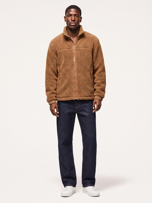 Camel brown sherpa fleece zip jacket worn by model, front view on white