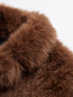 Faux fur jacket plush pile texture close up detail
