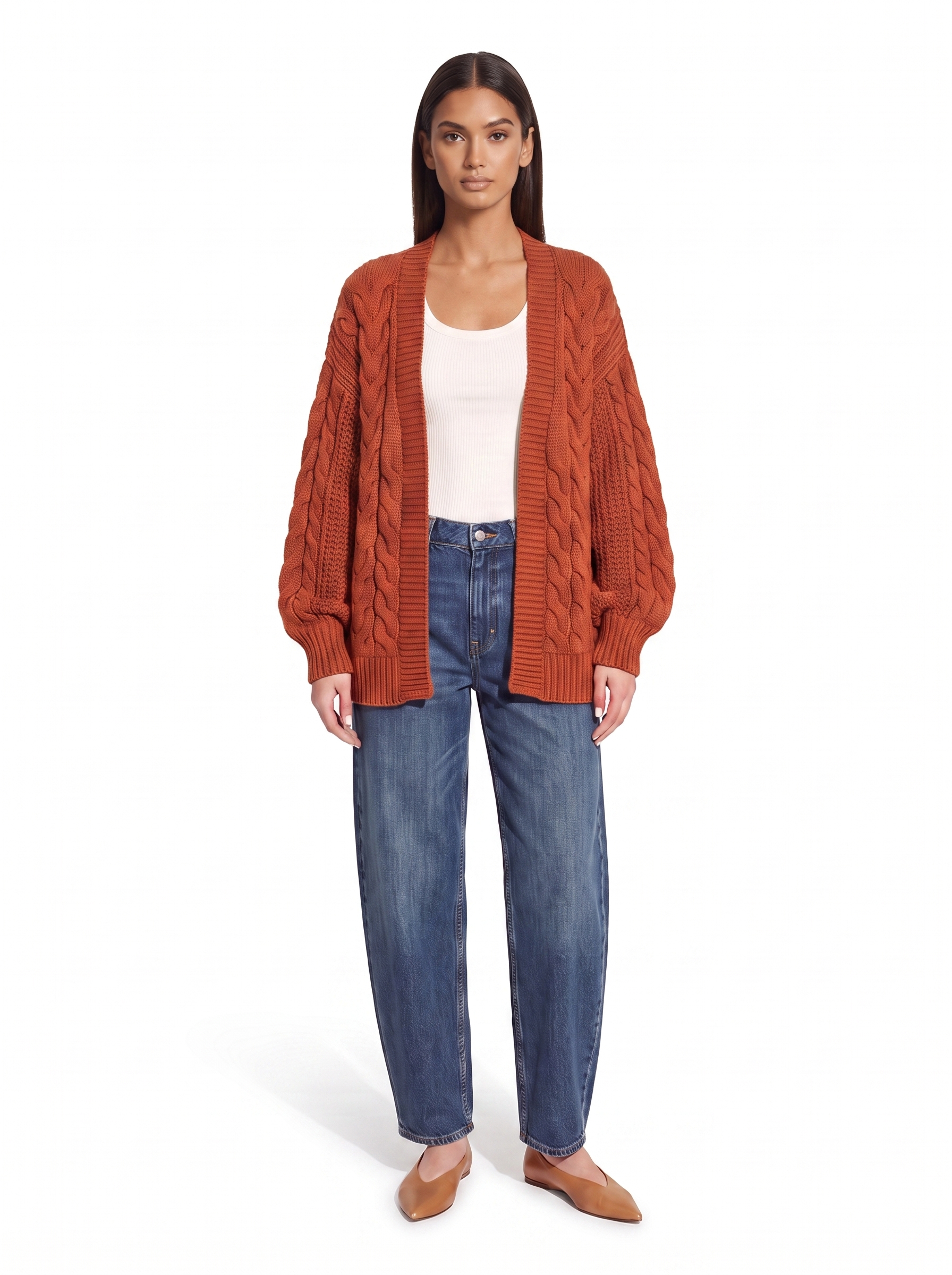 Rust chunky cable knit open front cardigan worn by model, front view on white