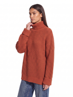 Oversized turtleneck drop shoulder fit three quarter view