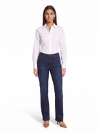 High waist dark indigo bootcut jeans worn by model, front view on white