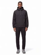 Black half zip hooded anorak worn by model, front view on white