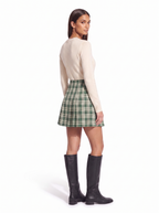 Pleated mini skirt A line flare three quarter view