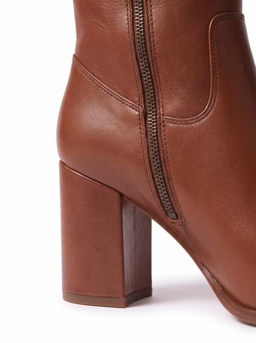 Riding boot zipper and heel close up detail