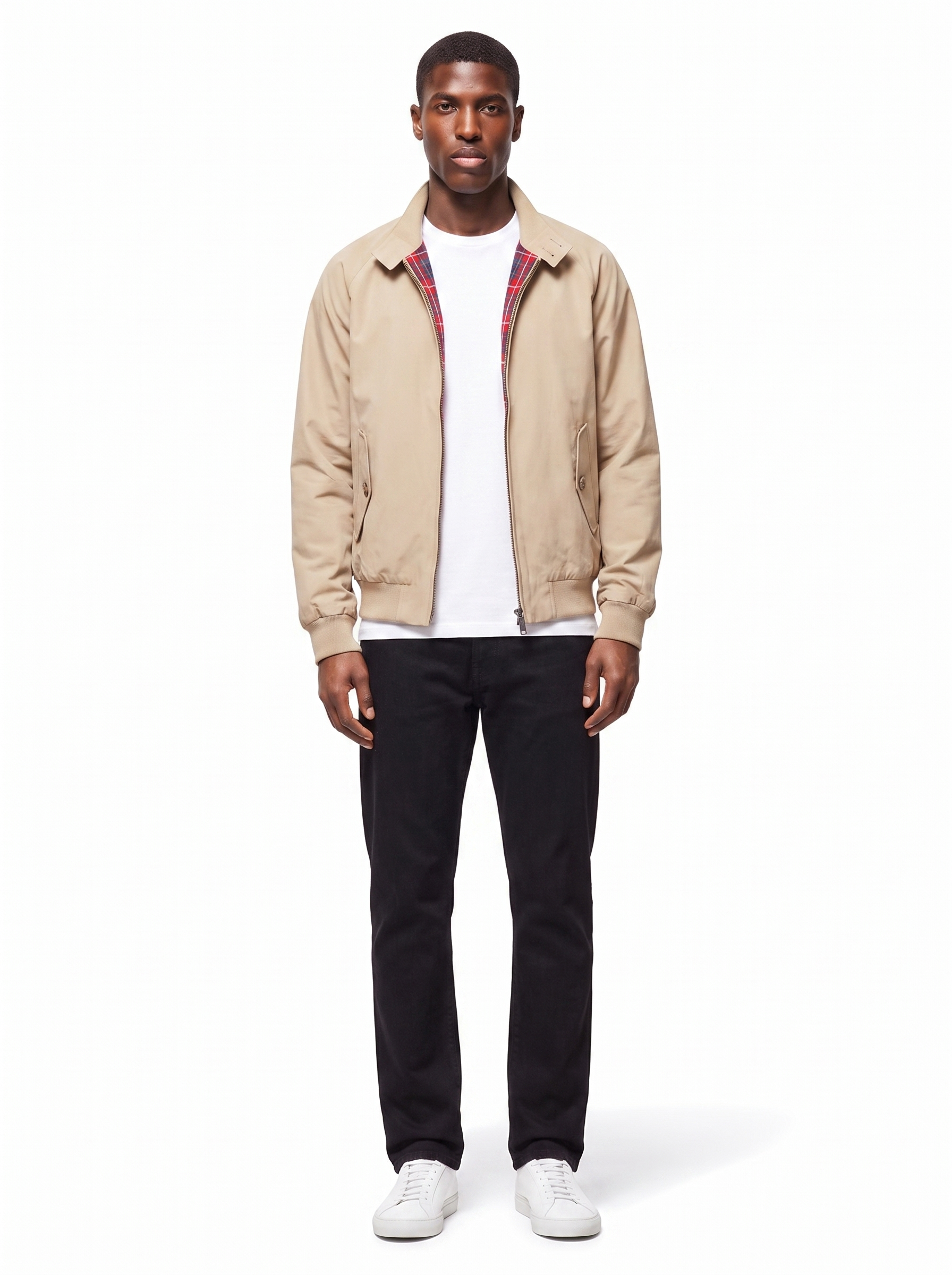 Beige harrington jacket with plaid lining worn by model, front view on white