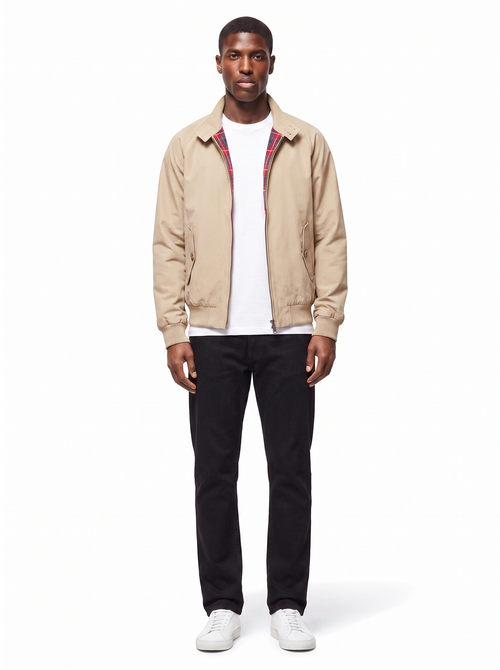 Beige harrington jacket with plaid lining worn by model, front view on white
