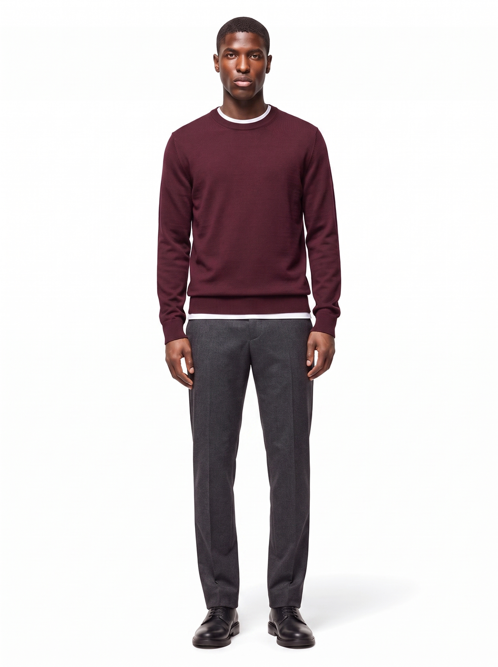 Deep burgundy crew neck sweater worn by model, front view on white