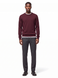 Deep burgundy crew neck sweater worn by model, front view on white