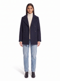 Navy pea coat on model full body