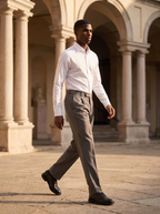 Grey pleated trousers lifestyle museum courtyard