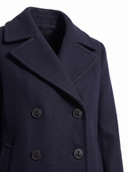 Lapel and anchor button detail close up