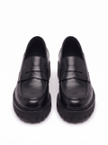 Black platform loafers product packshot on white