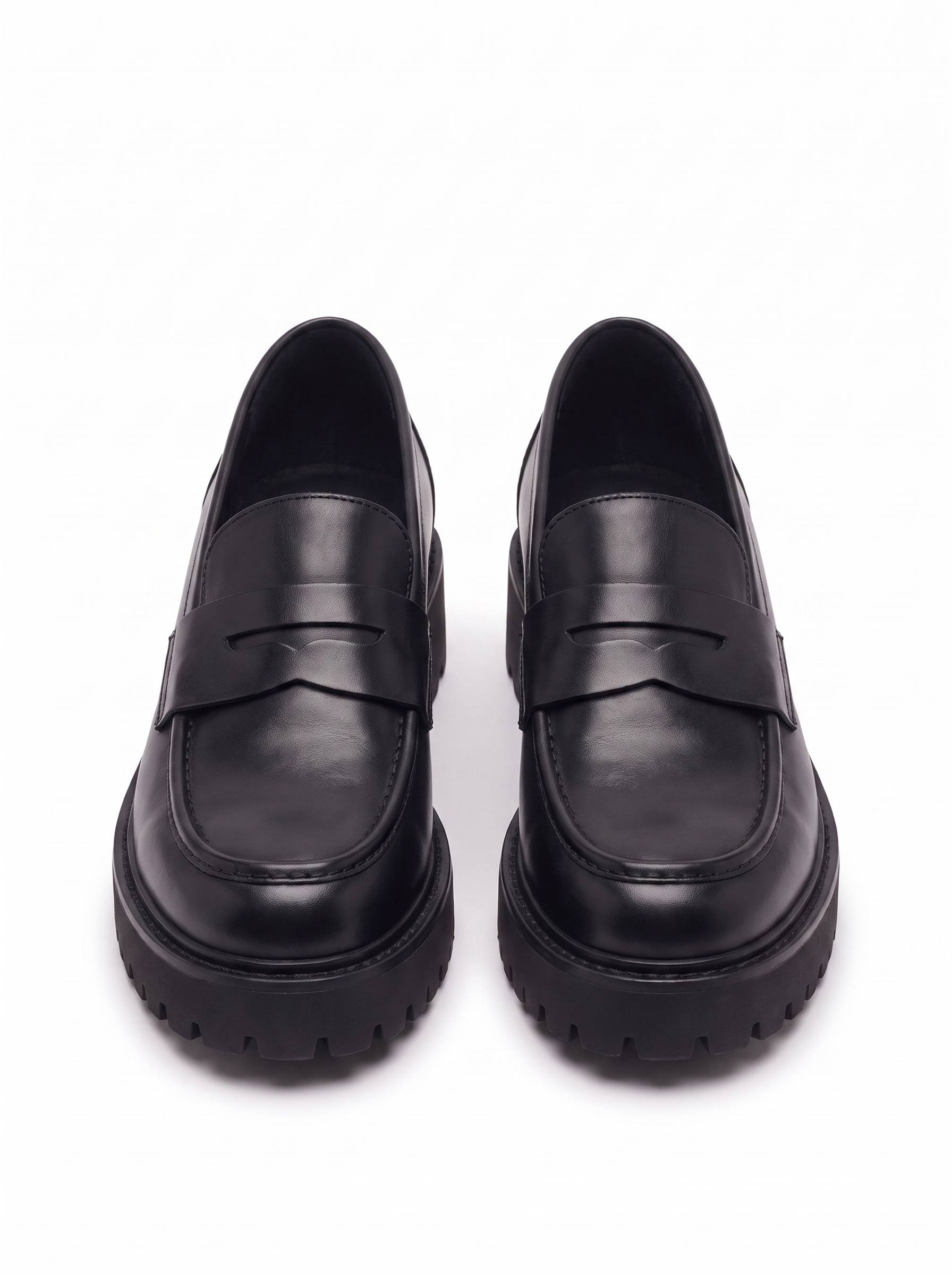 Black platform loafers product packshot on white