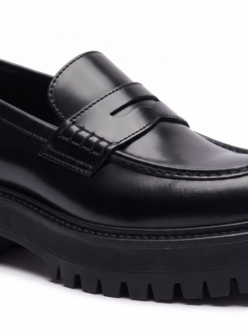 Penny strap and lug sole detail close up