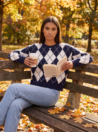 Argyle sweater lifestyle park bench autumn