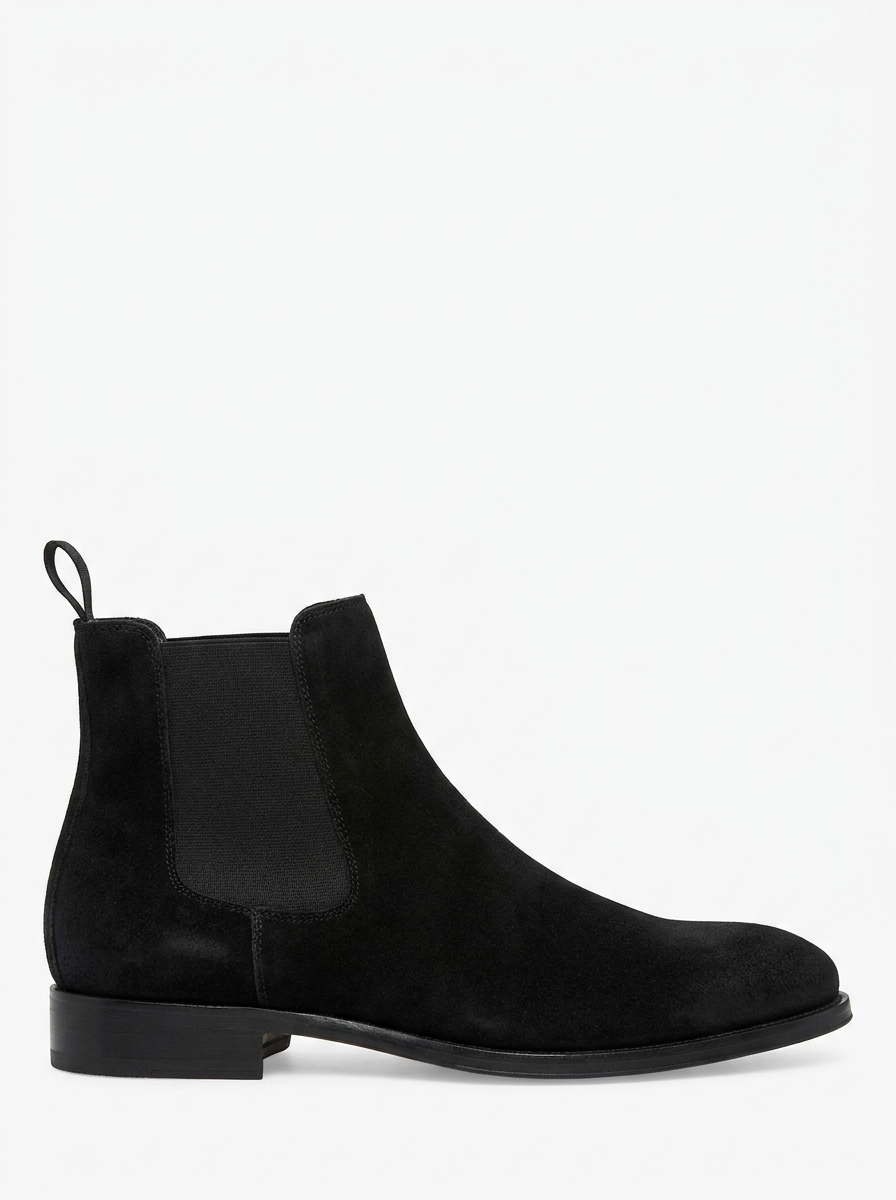 Black suede Chelsea boot, side profile on white background