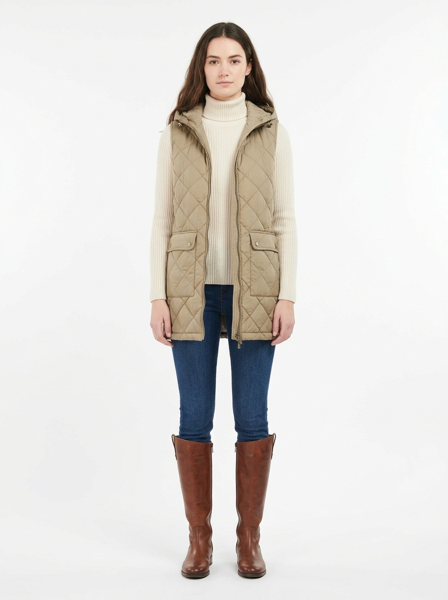 Khaki hooded quilted vest worn by model, front view on white