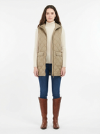 Khaki hooded quilted vest worn by model, front view on white