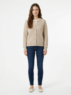 Oatmeal knit cardigan worn by model, front view on white