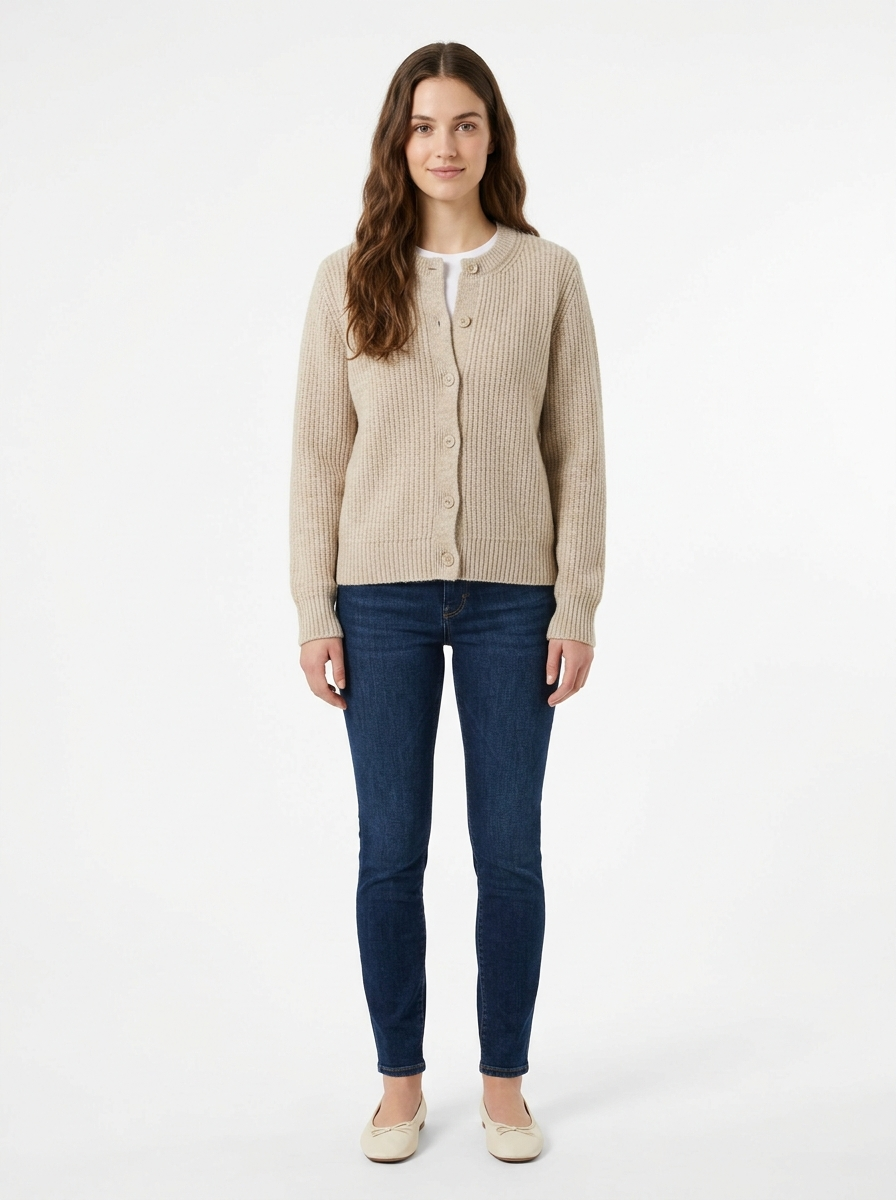 Oatmeal knit cardigan worn by model, front view on white