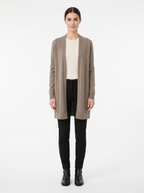 Taupe longline cardigan worn by model, front view on white