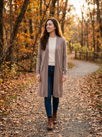 Woman wearing taupe longline open cardigan with jeans in autumn