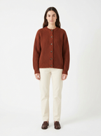 Chestnut chunky knit cardigan worn by model, front view on white
