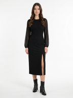 Black sheer sleeve midi dress worn by model, front view on white