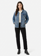 Mid wash distressed denim jacket worn by model, front view on white