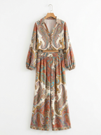 Paisley pantsuit two-piece on wooden hanger