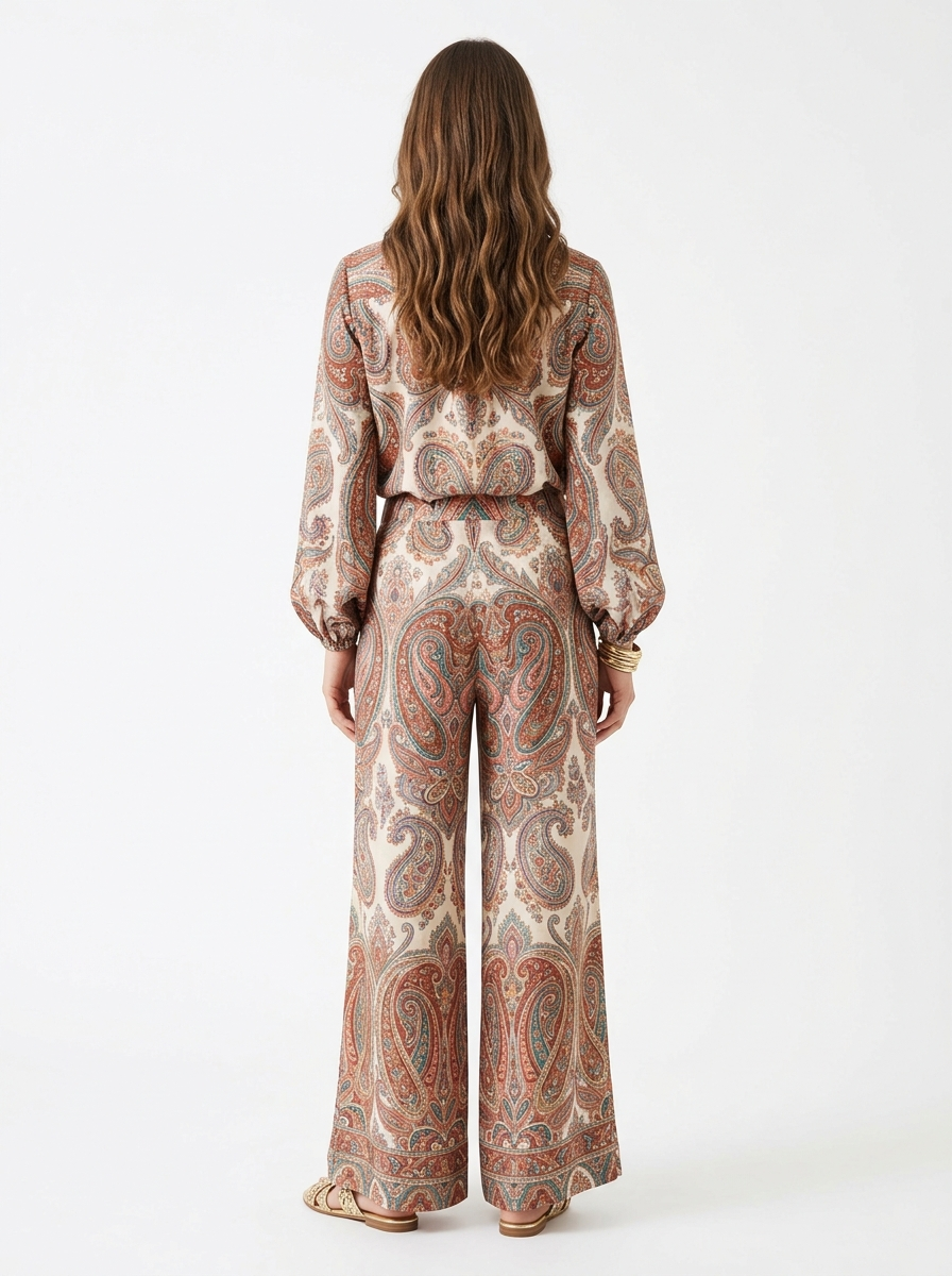 Multicolor paisley print pantsuit worn by model, back on white